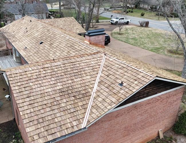 a roof with wood shingles